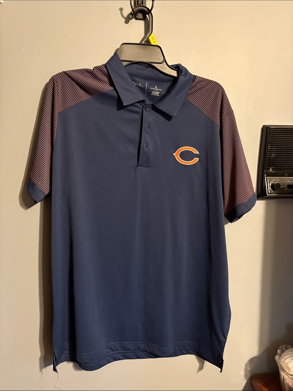 Antigua Navy Polo with Orange Accent and Striped Shoulder Panels